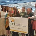 Photo with event sponsor NPCF at opening night 